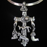 Milagro Cross Pendant in Sterling Silver from Oaxaca, Mexico – Sun & Moon Motif